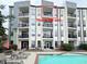 Exterior view of apartment building's pool and common area at 2630 Talley St # 426, Decatur, GA 30030