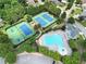 Community amenities include sparkling pool and tennis and basketball courts, surrounded by mature trees and manicured grounds at 1020 Constitution Way, Cumming, GA 30040