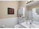 Bathroom features a white vanity, tile backsplash, and a shower with glass door at 1020 Constitution Way, Cumming, GA 30040