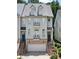 Charming townhome with double balconies, brick accents, and attached garage at 1020 Constitution Way, Cumming, GA 30040