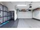 Organized two-car garage with ample storage cabinets and shelving for tools and equipment at 1020 Constitution Way, Cumming, GA 30040