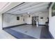 Spacious garage with ample storage and utility sink; perfect for projects and parking at 1020 Constitution Way, Cumming, GA 30040