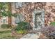 Charming brick townhouse with a well-manicured lawn and inviting entryway at 1496 Leafmore Pl, Decatur, GA 30033