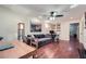 Bright living area with hardwood floors, a comfortable sofa, and a dining table at 1496 Leafmore Pl, Decatur, GA 30033