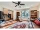 Cozy living room with hardwood floors, neutral tones, and large windows at 1496 Leafmore Pl, Decatur, GA 30033