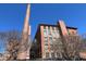 Exterior of the building with smokestacks and exposed brick at 170 Boulevard Se # 421 H, Atlanta, GA 30312