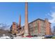 Brick mill buildings with smokestacks, parked cars in lot at 170 Boulevard Se # 421 H, Atlanta, GA 30312