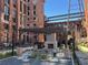 Outdoor fireplace with seating, pergola, and views of the community at 170 Boulevard Se # 421 H, Atlanta, GA 30312