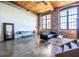 Exposed brick and polished concrete of a stylish loft with vaulted wood ceilings at 170 Boulevard Se # 421 H, Atlanta, GA 30312
