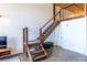 Living room with open staircase to loft area, modern lighting, and visible ductwork at 170 Boulevard Se # 421 H, Atlanta, GA 30312