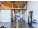 View of open loft living area with kitchen, hardwood ceilings, and polished concrete floors at 170 Boulevard Se # 421 H, Atlanta, GA 30312