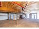 Carpeted loft space with exposed beams, modern lighting, and large windows at 170 Boulevard Se # 421 H, Atlanta, GA 30312