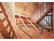 Exposed beams and wood sheathing in the home's unfinished attic at 2051 E Piedmont Rd, Marietta, GA 30062