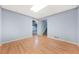 Finished basement area has blue painted walls, tile flooring, and recessed lighting at 2051 E Piedmont Rd, Marietta, GA 30062