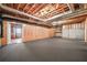 Spacious finished basement with wood paneling, carpet flooring, and exposed ductwork at 2051 E Piedmont Rd, Marietta, GA 30062