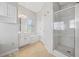 Light and airy bathroom with modern glass shower, and a white vanity at 2051 E Piedmont Rd, Marietta, GA 30062