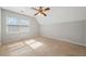 Bedroom with neutral carpet, ceiling fan, and a window with blinds at 2051 E Piedmont Rd, Marietta, GA 30062