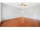 This bedroom features hardwood floors and a door to the hallway at 2051 E Piedmont Rd, Marietta, GA 30062