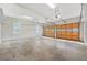A spacious two-car garage with paneled doors and concrete flooring at 2051 E Piedmont Rd, Marietta, GA 30062