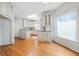 Kitchen view features white cabinets, granite counters, and stainless appliances at 2051 E Piedmont Rd, Marietta, GA 30062