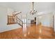 Open floor plan with wood floors, fireplace, and natural light at 2051 E Piedmont Rd, Marietta, GA 30062