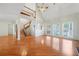 Living room features high ceilings, hardwood floors, stairway, and natural light at 2051 E Piedmont Rd, Marietta, GA 30062