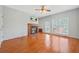 Spacious living room with wood floors, fireplace, and sliding glass doors leading to outdoor space at 2051 E Piedmont Rd, Marietta, GA 30062
