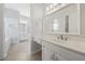 Elegant main bathroom features a double vanity with a large mirror and shower at 2051 E Piedmont Rd, Marietta, GA 30062