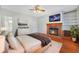 This main bedroom features a fireplace, flatscreen tv and door leading to main bathroom at 2051 E Piedmont Rd, Marietta, GA 30062