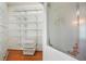 Spacious walk-in pantry with wire shelving and frosted glass door at 2051 E Piedmont Rd, Marietta, GA 30062