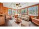 Comfortable sunroom with wood accents, built-in benches, and natural light at 2051 E Piedmont Rd, Marietta, GA 30062