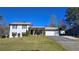 Charming two-story home featuring a spacious yard and attached garage, perfect for comfortable living at 3007 Hidden Dr, Lawrenceville, GA 30044