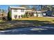 Charming two-story home featuring a spacious yard, black shutters, and an inviting front porch at 3007 Hidden Dr, Lawrenceville, GA 30044