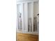 Hallway features decorative cubbies for displaying artistic cat figurines on hardwood flooring at 3007 Hidden Dr, Lawrenceville, GA 30044