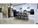 Spacious kitchen features a large center island, white cabinets, tile flooring, and modern appliances at 3007 Hidden Dr, Lawrenceville, GA 30044
