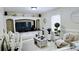 Bright living room featuring built in shelving and neutral decor at 3007 Hidden Dr, Lawrenceville, GA 30044