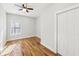 Bedroom with hardwood floors, neutral walls, and double-door closet at 793 Joseph E Boone Nw Blvd, Atlanta, GA 30314