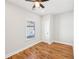 Cozy bedroom with hardwood floors and a neutral color palette at 793 Joseph E Boone Nw Blvd, Atlanta, GA 30314