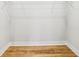 Empty closet with hardwood floors and a wire rack at 793 Joseph E Boone Nw Blvd, Atlanta, GA 30314