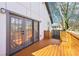 View of the deck with double doors leading into the home at 793 Joseph E Boone Nw Blvd, Atlanta, GA 30314