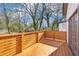 Deck with wood railings and outdoor access from the house at 793 Joseph E Boone Nw Blvd, Atlanta, GA 30314