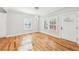Bright dining area with hardwood floors, modern lighting, and large windows providing natural light at 793 Joseph E Boone Nw Blvd, Atlanta, GA 30314