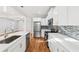 Gleaming kitchen with stainless appliances and white countertops at 793 Joseph E Boone Nw Blvd, Atlanta, GA 30314
