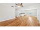 Large living room with hardwood floors, a ceiling fan, and abundant natural light at 793 Joseph E Boone Nw Blvd, Atlanta, GA 30314