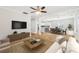 Open-concept living room flowing into the dining area and kitchen perfect for entertaining guests at 793 Joseph E Boone Nw Blvd, Atlanta, GA 30314