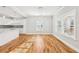 Bright open-concept living space with modern finishes, and views of the kitchen and dining spaces at 793 Joseph E Boone Nw Blvd, Atlanta, GA 30314