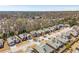 An aerial view of a suburban neighborhood, showcasing well-manicured lawns and mature trees at 1913 Shenley Park Ln, Duluth, GA 30097