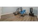 Workout area in basement showcasing fitness equipment and durable flooring at 1913 Shenley Park Ln, Duluth, GA 30097