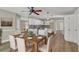 Eat-in kitchen featuring modern fixtures, white cabinetry, granite countertops, and updated appliances at 2000 Mcconnell Rd, Grayson, GA 30017