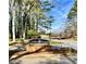 Entrance sign for Cedar Canyon Condominiums surrounded by trees and landscaping at 2459 Cedar Canyon Se Ct, Marietta, GA 30067